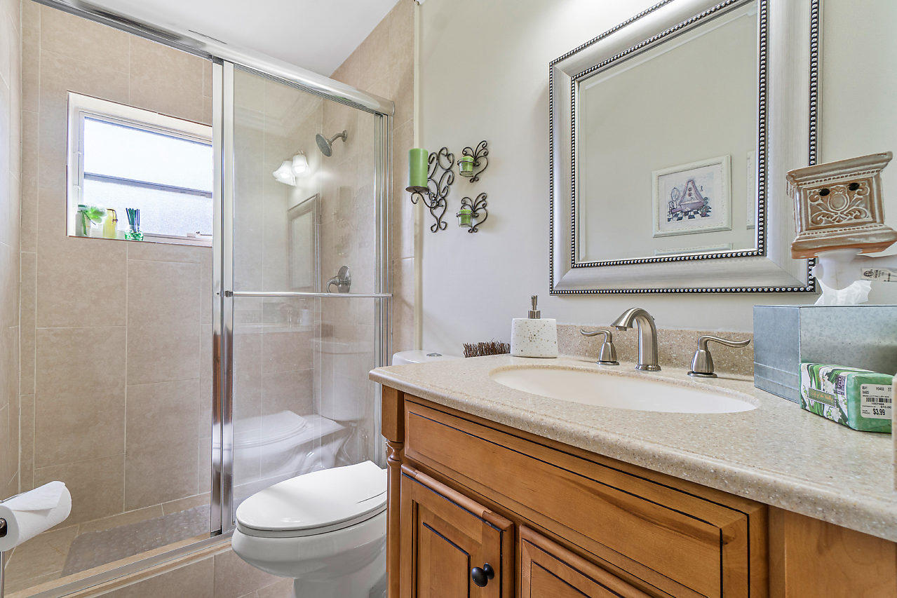 4855 Equestrian Road, Unit B Boynton Beach, FL 33436 - Photo 22 of 38 Guest Bathroom with Walk in Shower