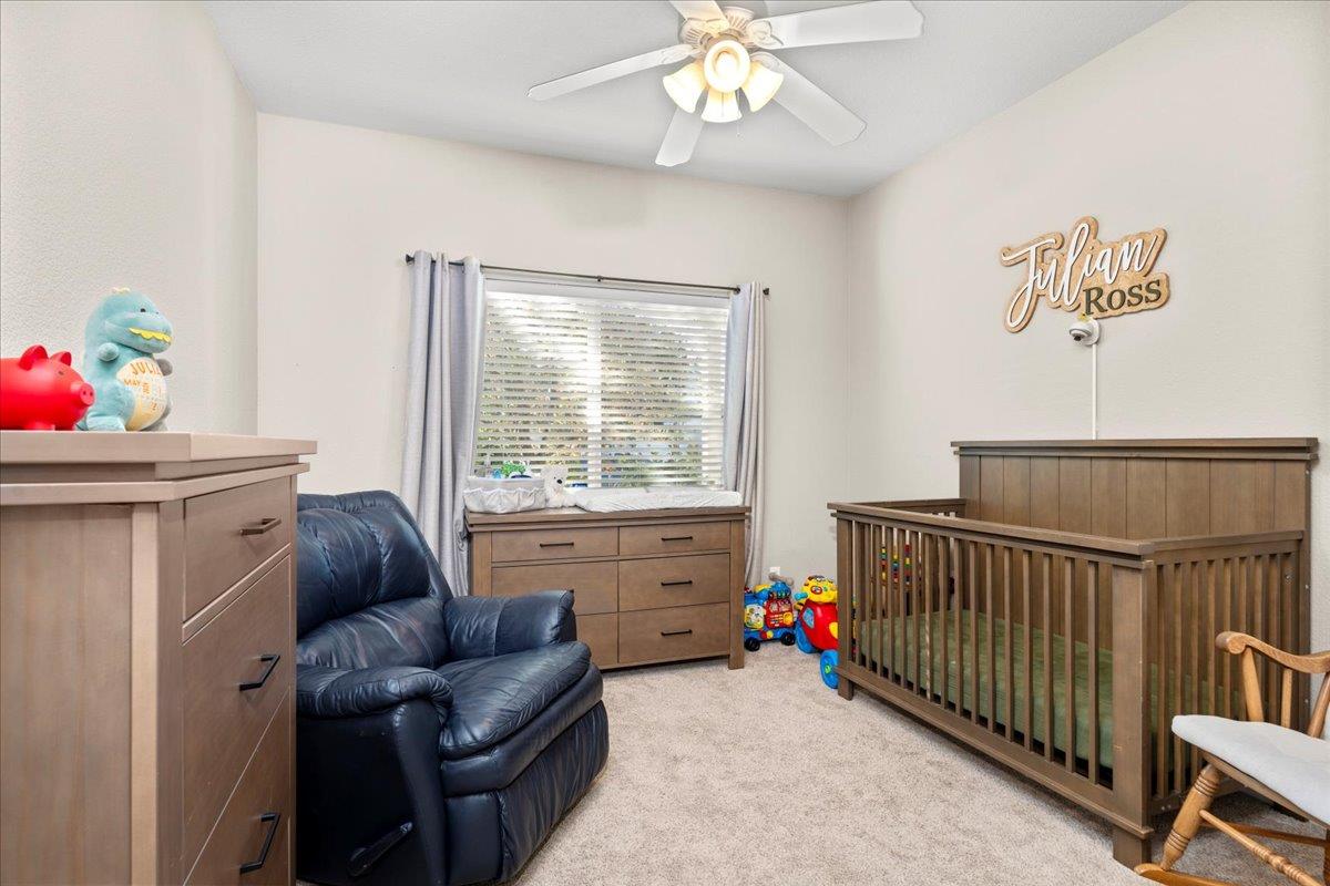 1725 Stonum Road Modesto, CA 95351 - Photo 19 of 34 a room with furniture and stairs