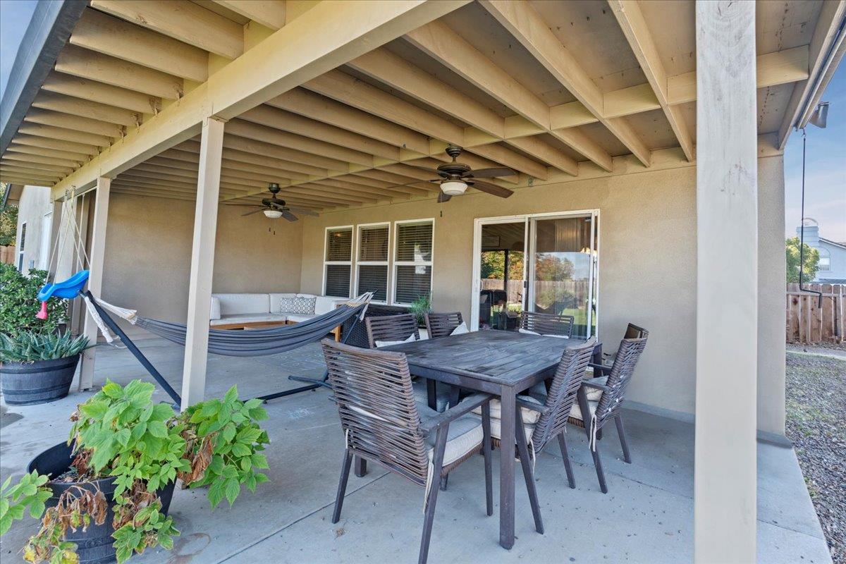 1725 Stonum Road Modesto, CA 95351 - Photo 25 of 34 a view of an outside dining space with furniture