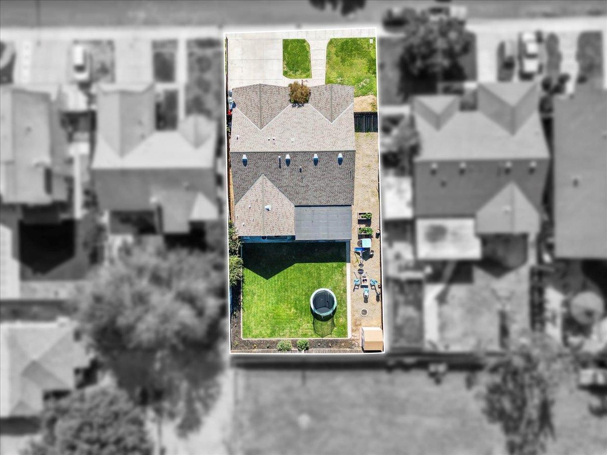 1725 Stonum Road Modesto, CA 95351 - Photo 32 of 34 an aerial view of residential houses with outdoor space
