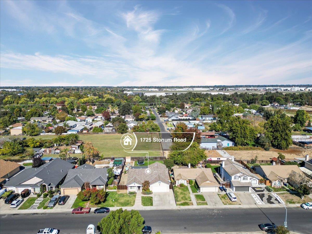1725 Stonum Road Modesto, CA 95351 - Photo 34 of 34 an aerial view of residential houses with outdoor space