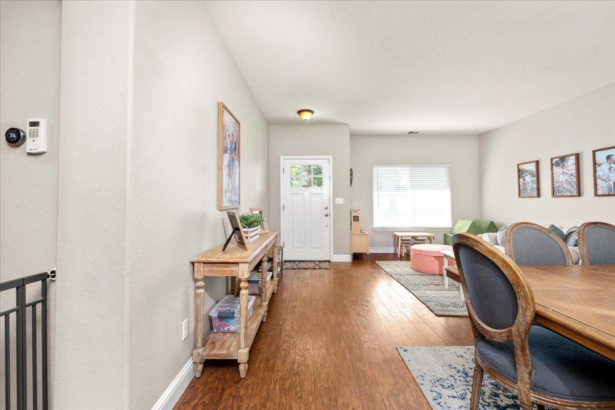 1725 Stonum Road Modesto, CA 95351 - Photo 5 of 34 a view of a livingroom with furniture and hardwood floor