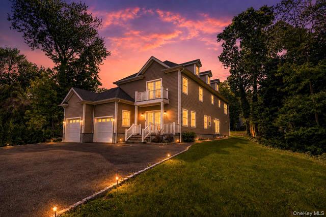1 Kewanee Road New Rochelle, NY 10804 - Photo 4 of 36 a front view of a house with a yard