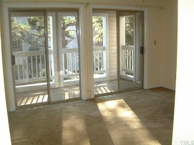 6121 Sunpointe Drive Raleigh, NC 27606 - Photo 2 of 9 View of both the Large and Bright Living Room and the Private Deck. Other
