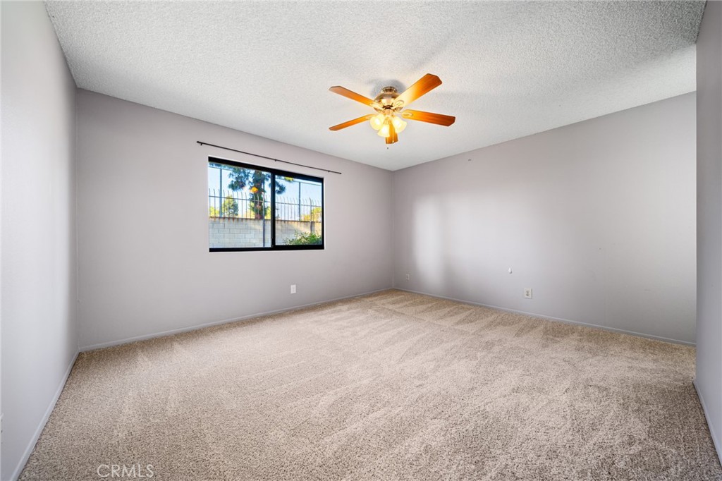 4630 San Jose Street, Unit T Montclair, CA 91763 - Photo 27 of 60 Primary bedroom Bedroom with attached bath