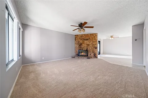 a view of empty room with windows