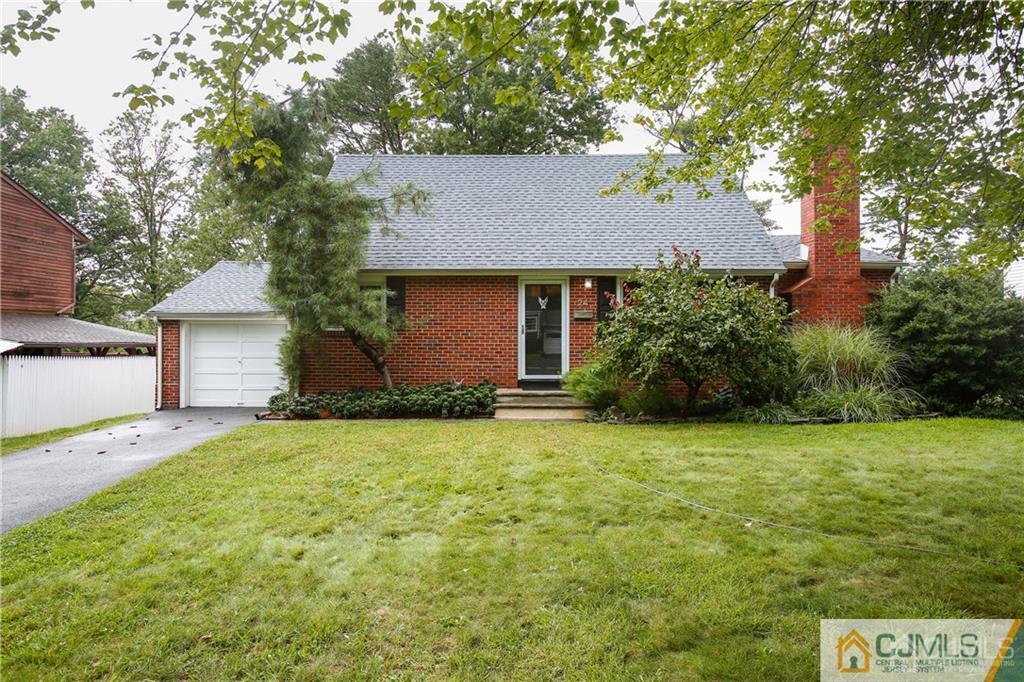 24 Halstead Road New Brunswick, NJ 08901 - Photo 1 of 23 a front view of house with yard and trees
