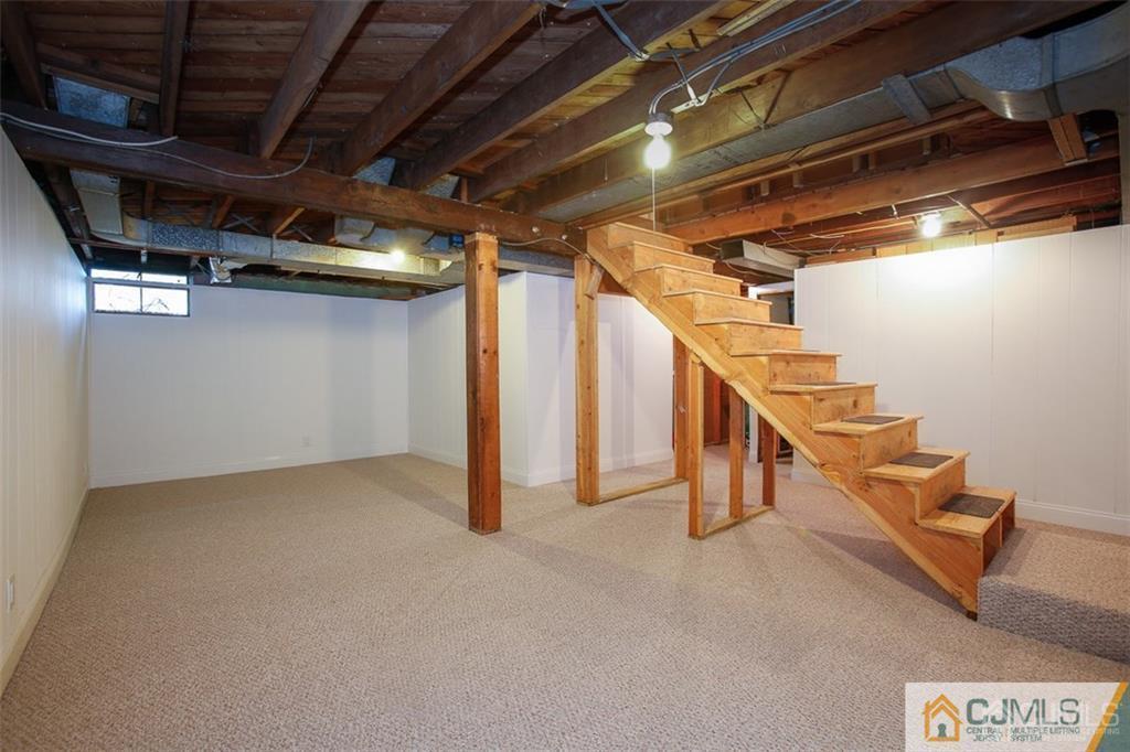 24 Halstead Road New Brunswick, NJ 08901 - Photo 19 of 23 a view of an empty room with stairs