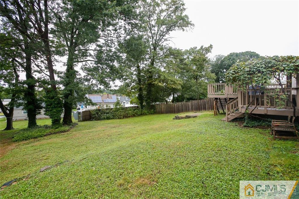 24 Halstead Road New Brunswick, NJ 08901 - Photo 23 of 23 a view of a house with backyard and a tree