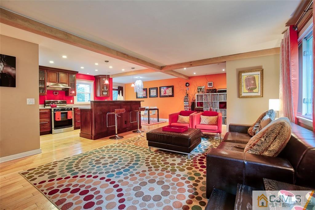 24 Halstead Road New Brunswick, NJ 08901 - Photo 4 of 23 a living room with furniture and kitchen view