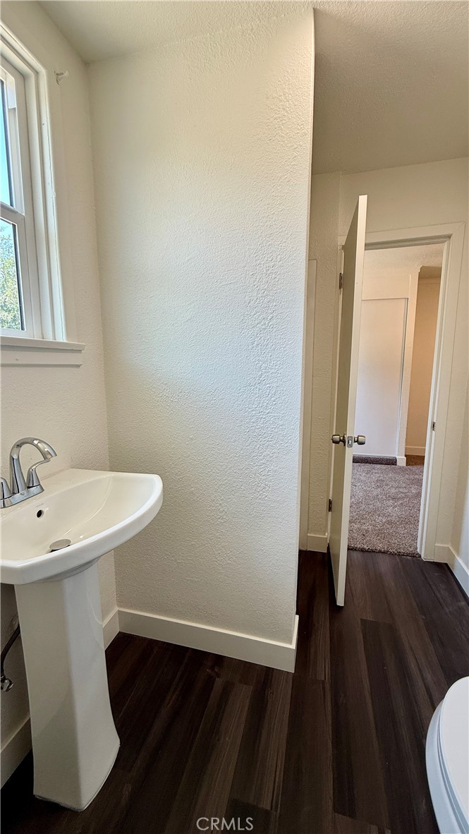 4542 Bandini Avenue Riverside, CA 92506 - Photo 22 of 22 a bathroom with a sink and a mirror