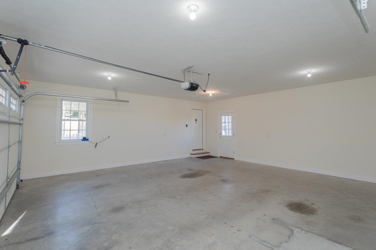 82 Smoky Row Road Staunton, VA 24401 - Photo 23 of 75 an empty room with a empty space and windows