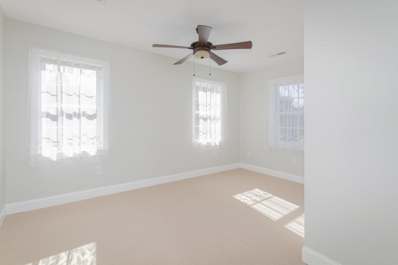 82 Smoky Row Road Staunton, VA 24401 - Photo 28 of 75 a view of empty room with wooden floor and fan