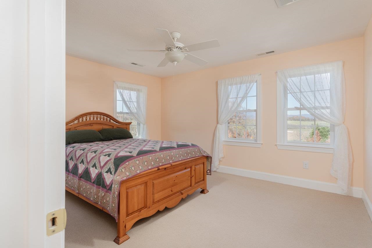 82 Smoky Row Road Staunton, VA 24401 - Photo 30 of 75 a bedroom with a bed and window