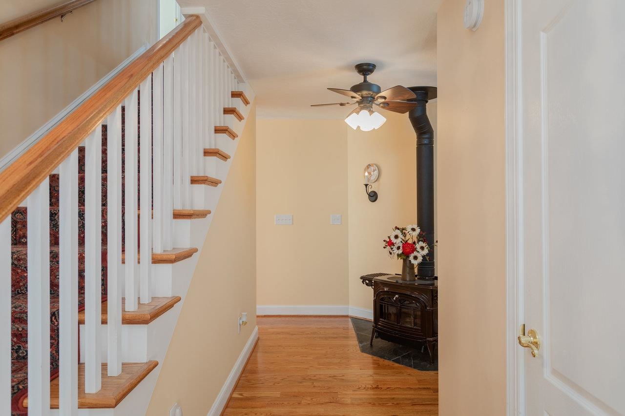 82 Smoky Row Road Staunton, VA 24401 - Photo 3 of 75 a view of a hallway with wooden floor and staircase