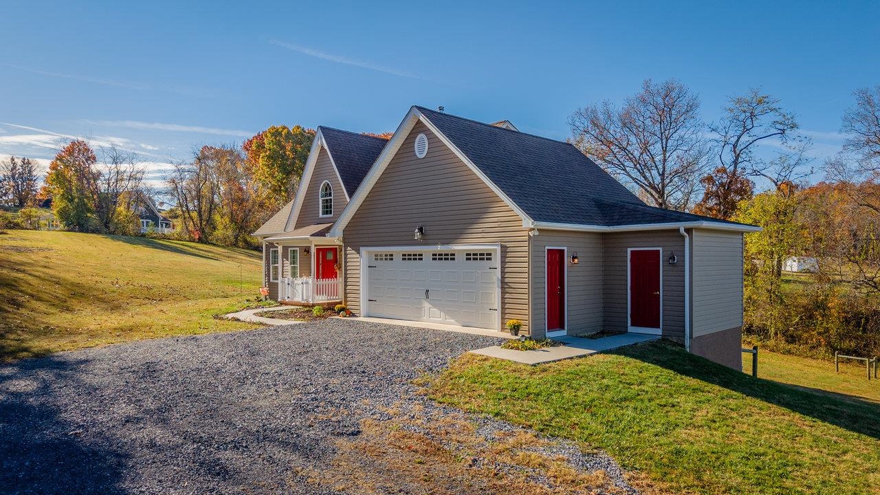 82 Smoky Row Road Staunton, VA 24401 - Photo 68 of 75 a view of large house with a yard and garage