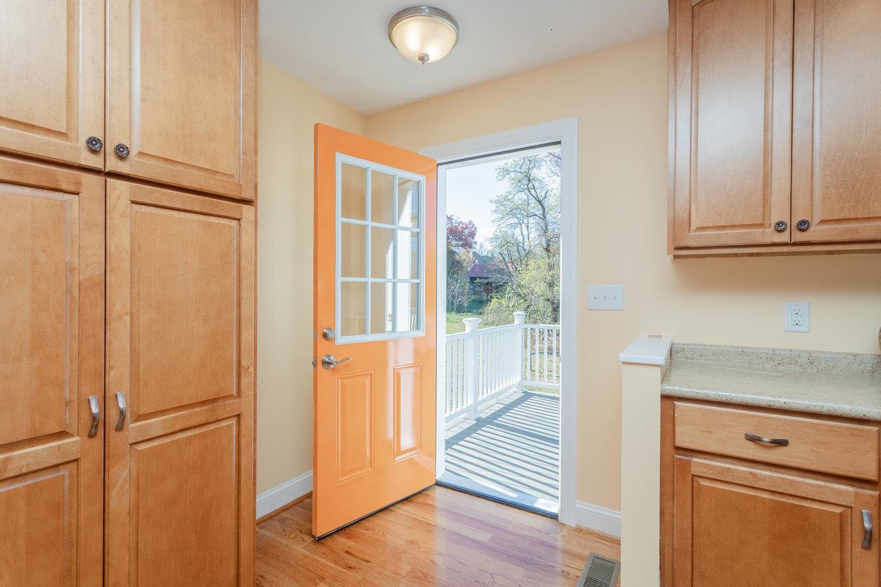 82 Smoky Row Road Staunton, VA 24401 - Photo 10 of 75 a view of a kitchen with wooden floor and furniture