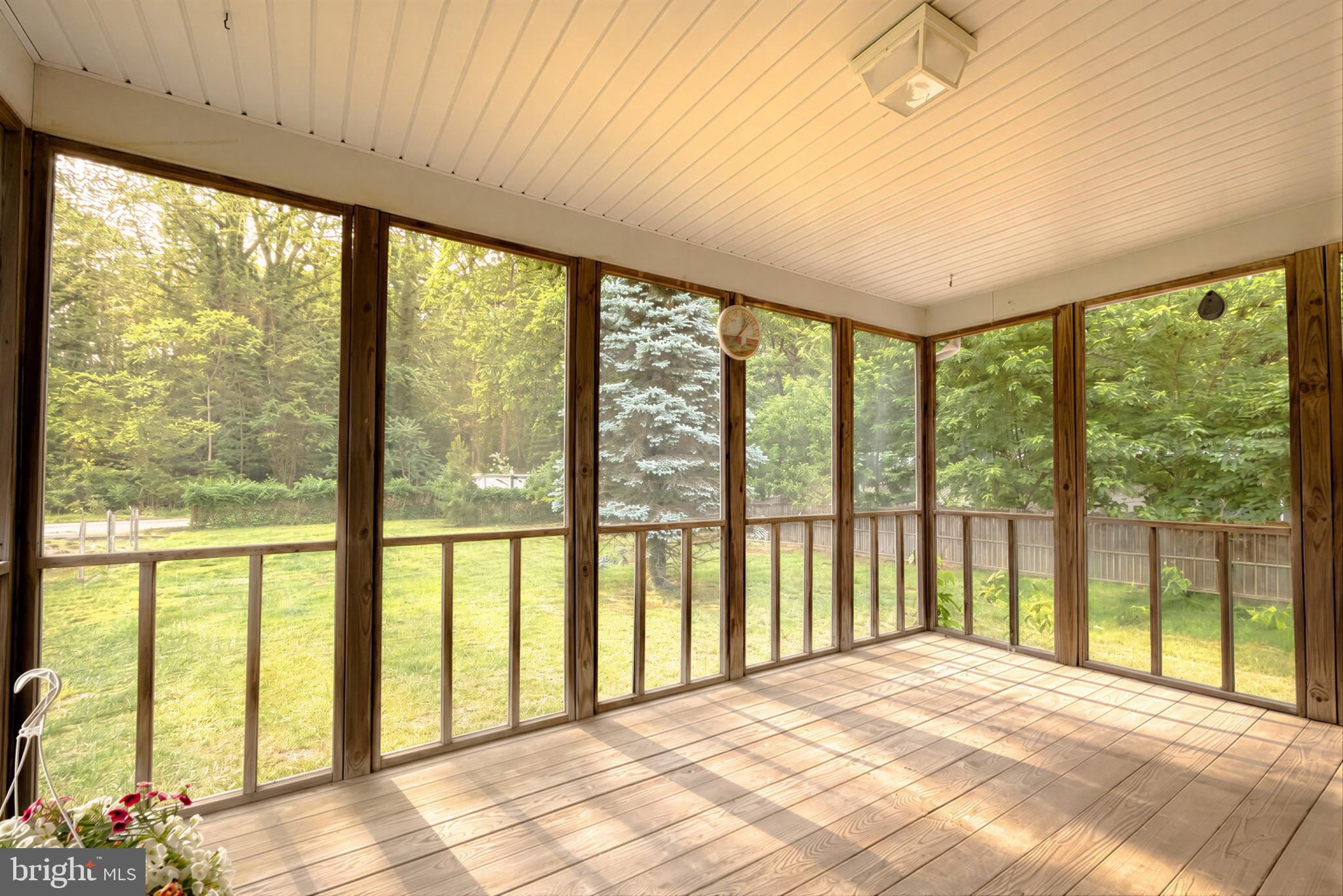 966 Crystal Rock Road Lusby, MD 20657 - Photo 13 of 49 Screened in deck/ privacy