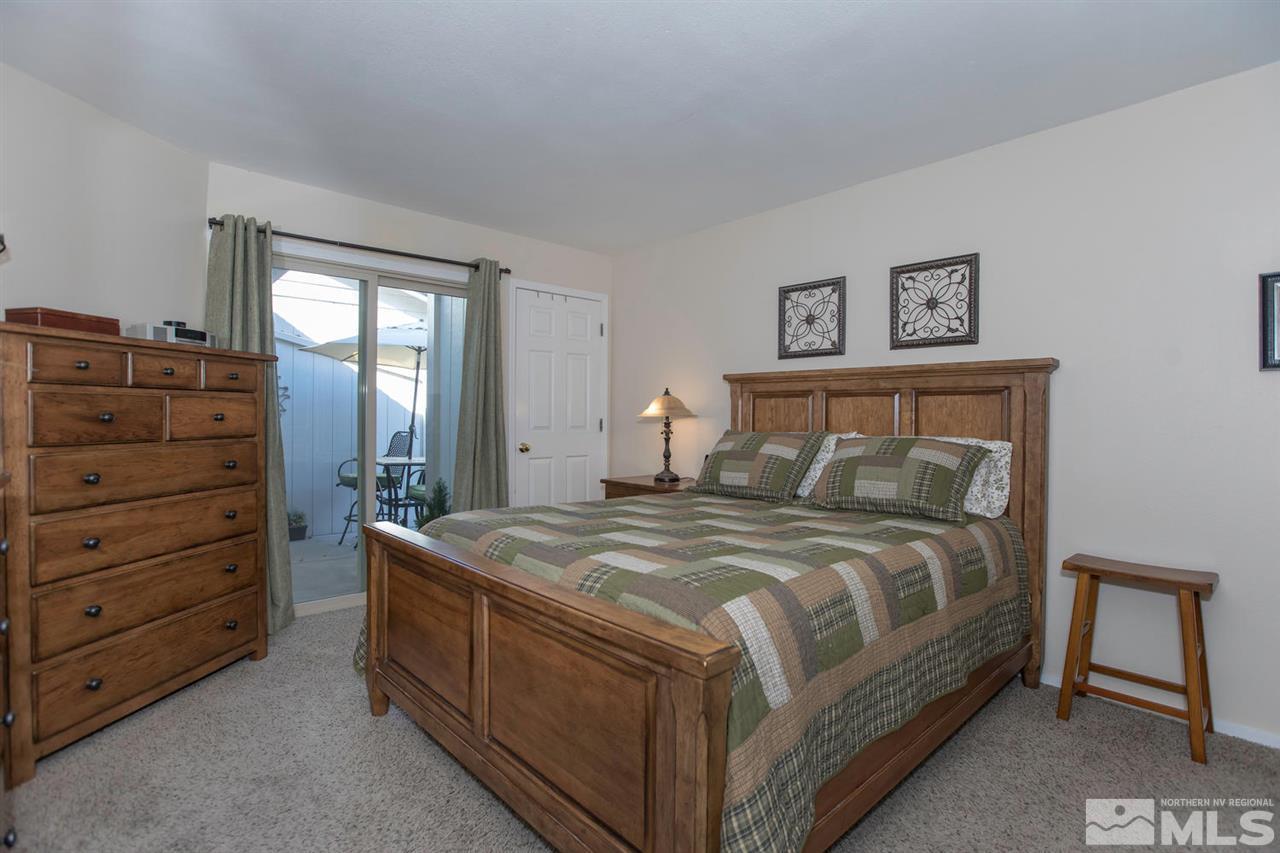 2264 Escalera Way Reno, NV 89523 - Photo 12 of 25 a bedroom with a bed and a dresser