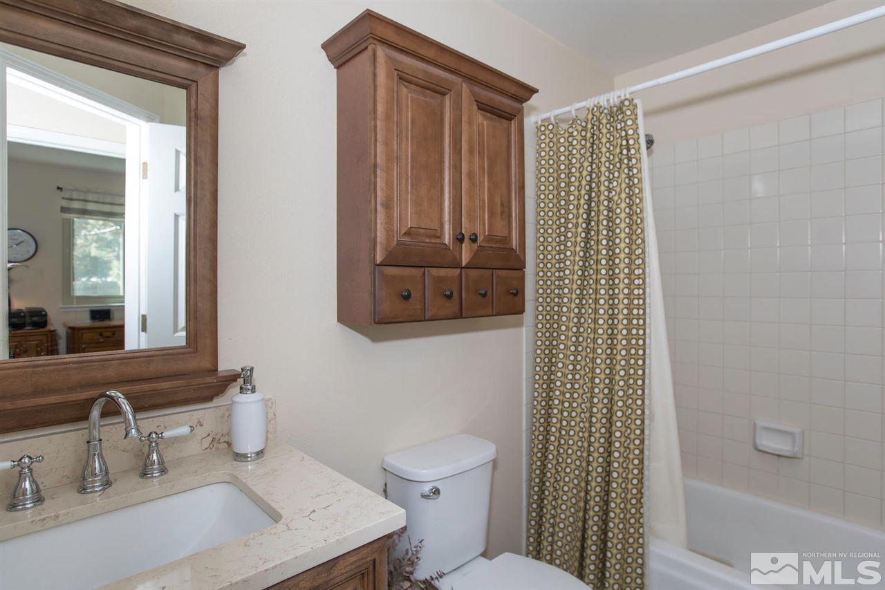 2264 Escalera Way Reno, NV 89523 - Photo 17 of 25 a bathroom with a sink toilet and shower