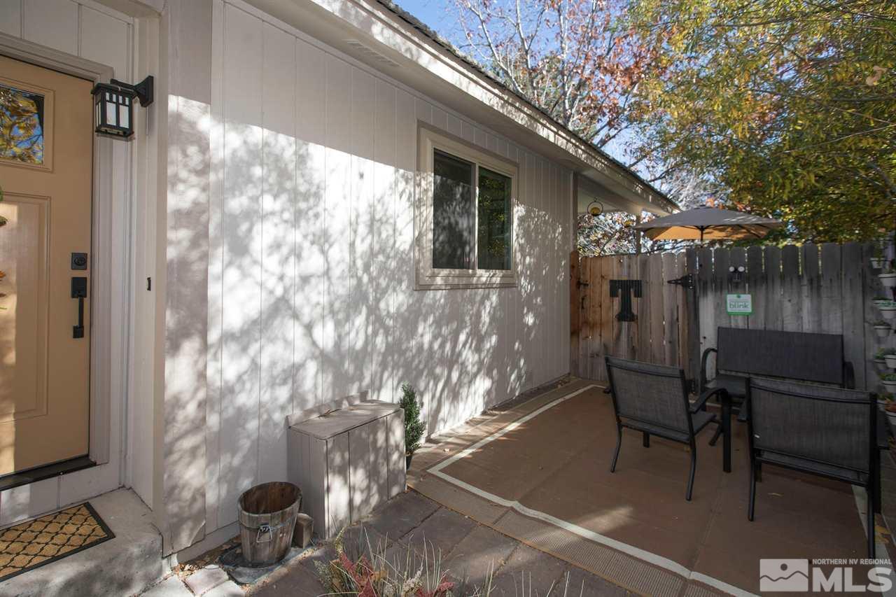 2264 Escalera Way Reno, NV 89523 - Photo 3 of 25 a view of a porch with chairs and backyard