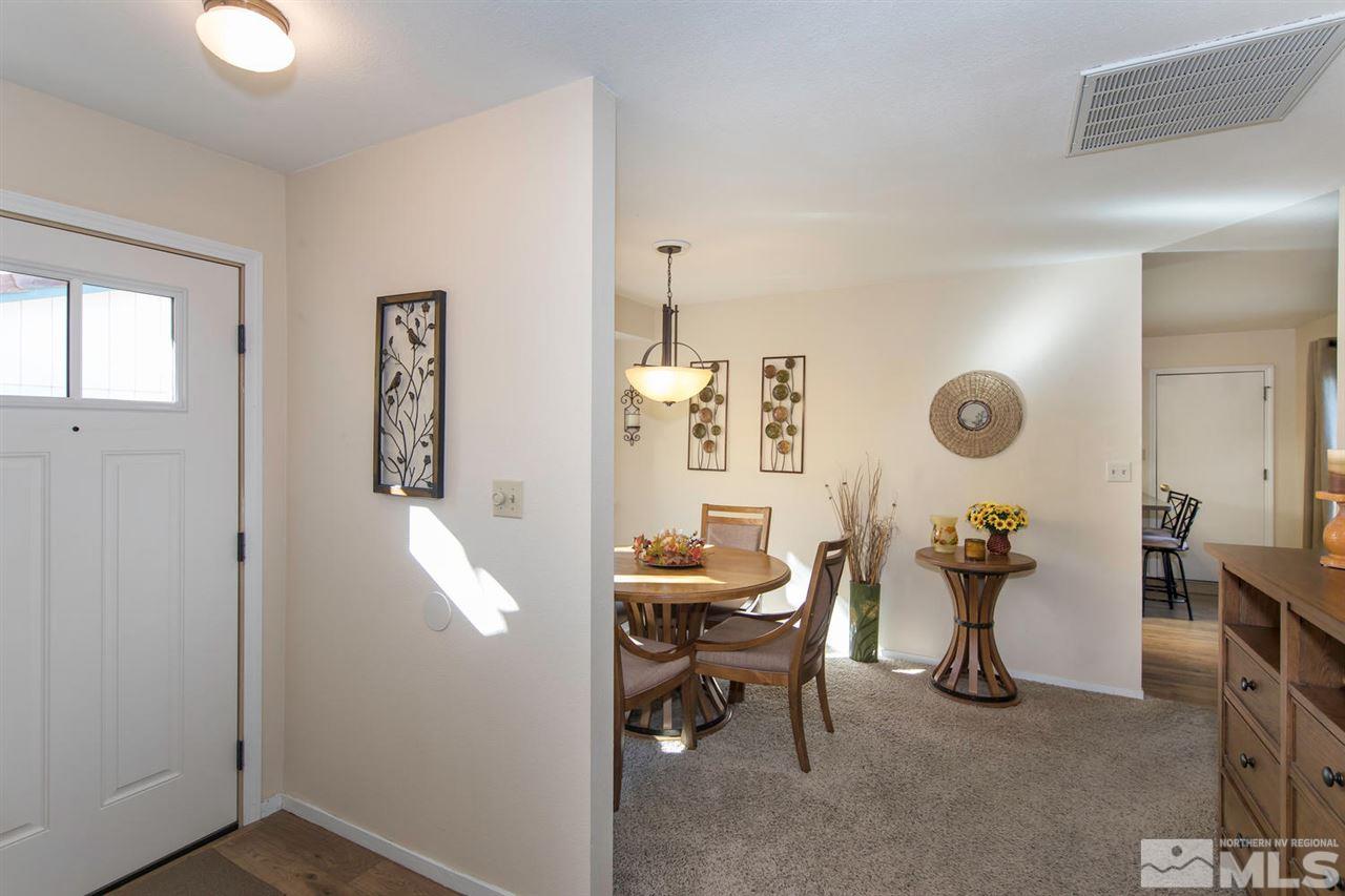 2264 Escalera Way Reno, NV 89523 - Photo 4 of 25 a room with table and chair