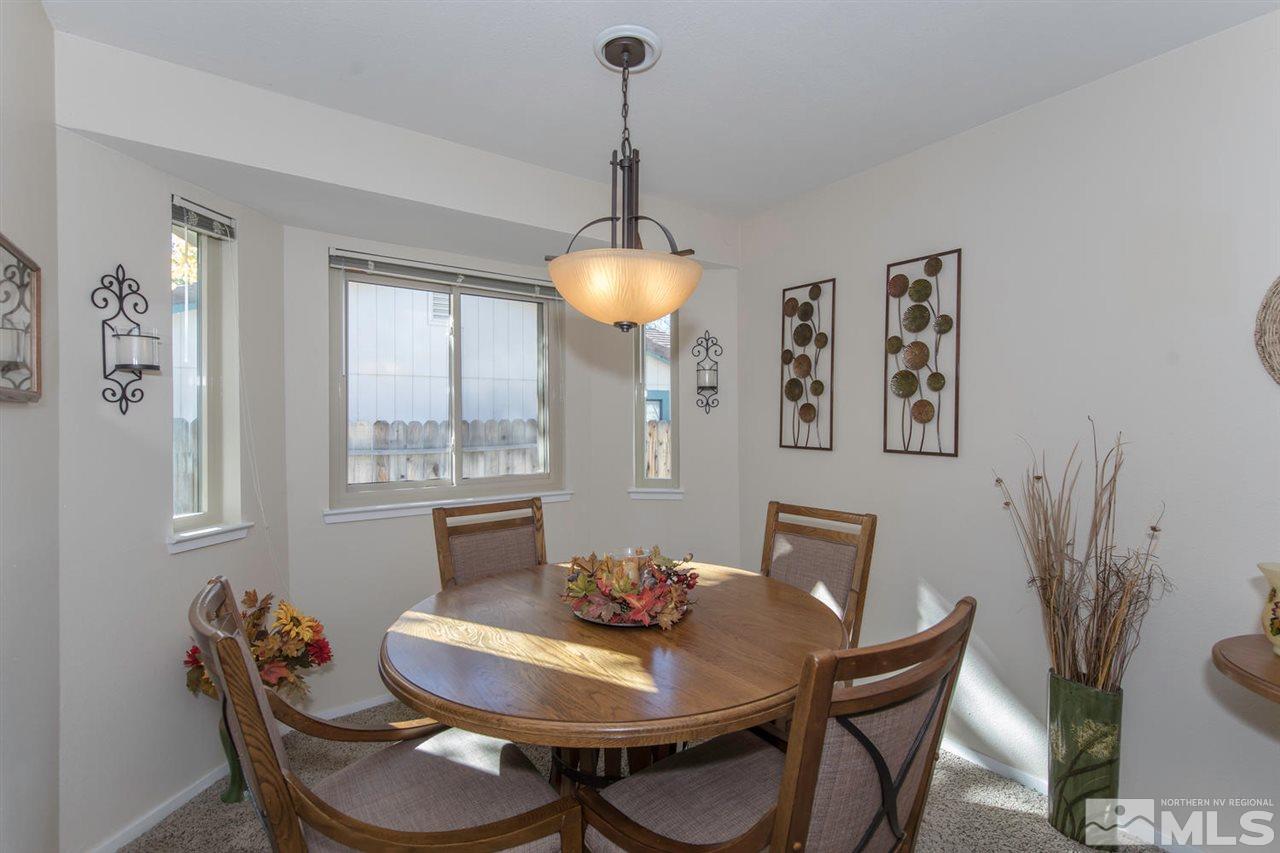 2264 Escalera Way Reno, NV 89523 - Photo 8 of 25 a dining room with furniture and window