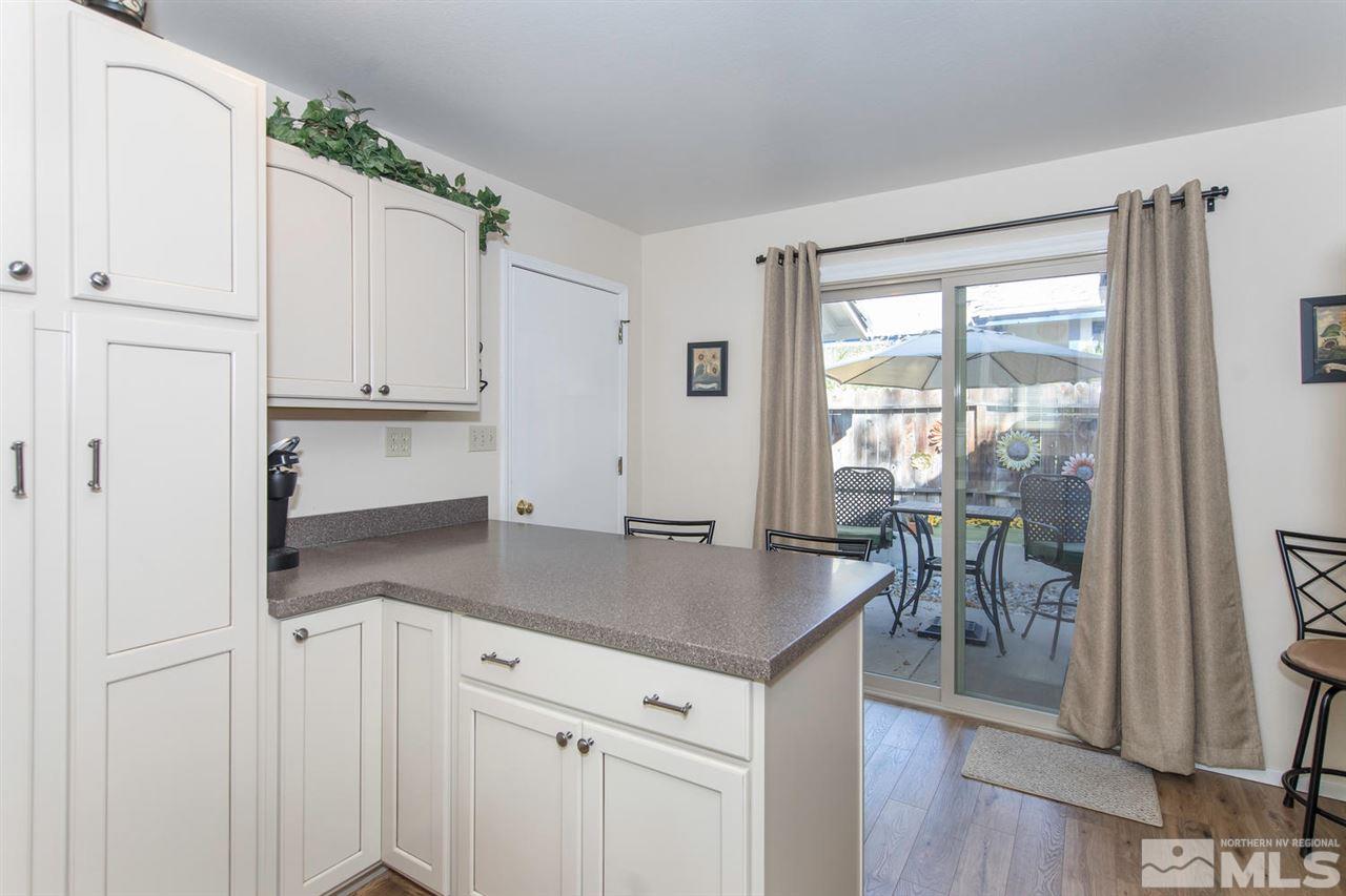2264 Escalera Way Reno, NV 89523 - Photo 9 of 25 a view of a kitchen with granite countertop cabinets