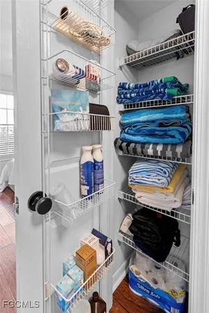 a kitchen with a stove and a chandelier