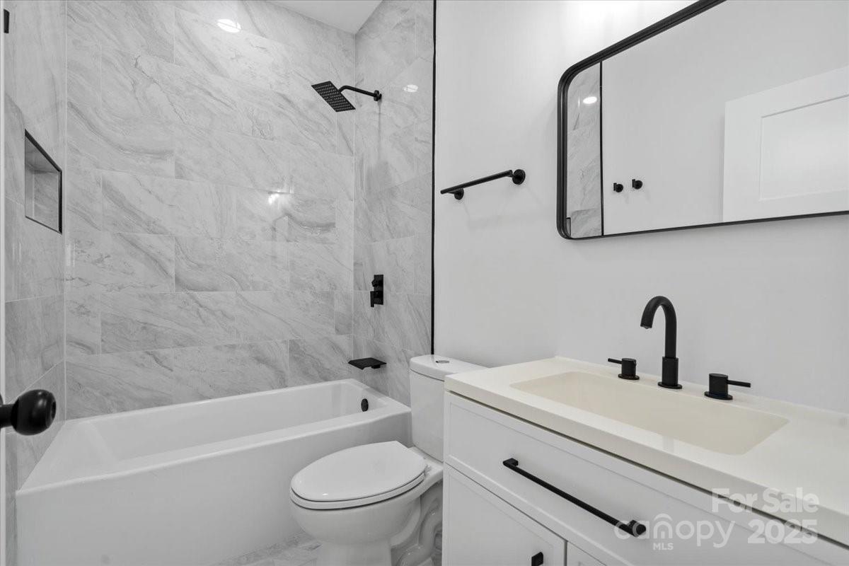 3156 Long Shoals Road Lincolnton, NC 28092 - Photo 19 of 21 a bathroom with a sink toilet and shower