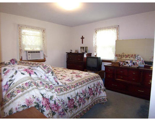 370 Morgan Road West Springfield, MA 01089 - Photo 9 of 10 a bedroom with a bed and window