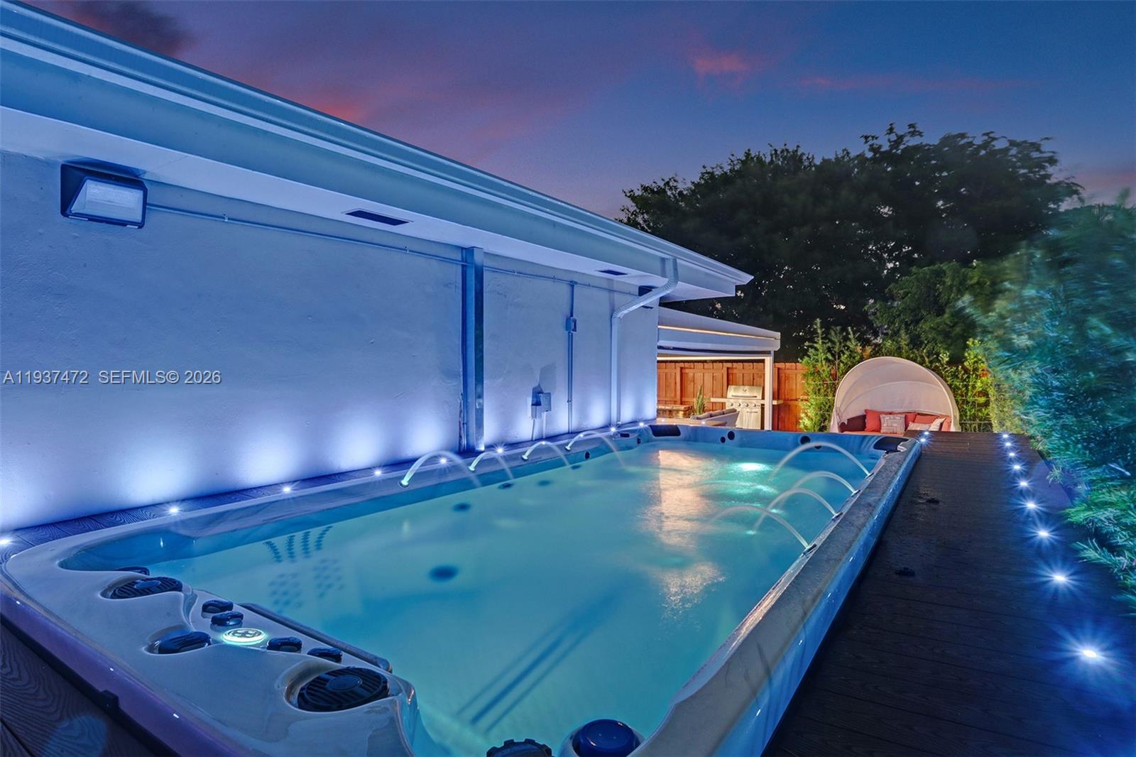 8843 Hawthorne Avenue Surfside, FL 33154 - Photo 5 of 28 a view of a pool