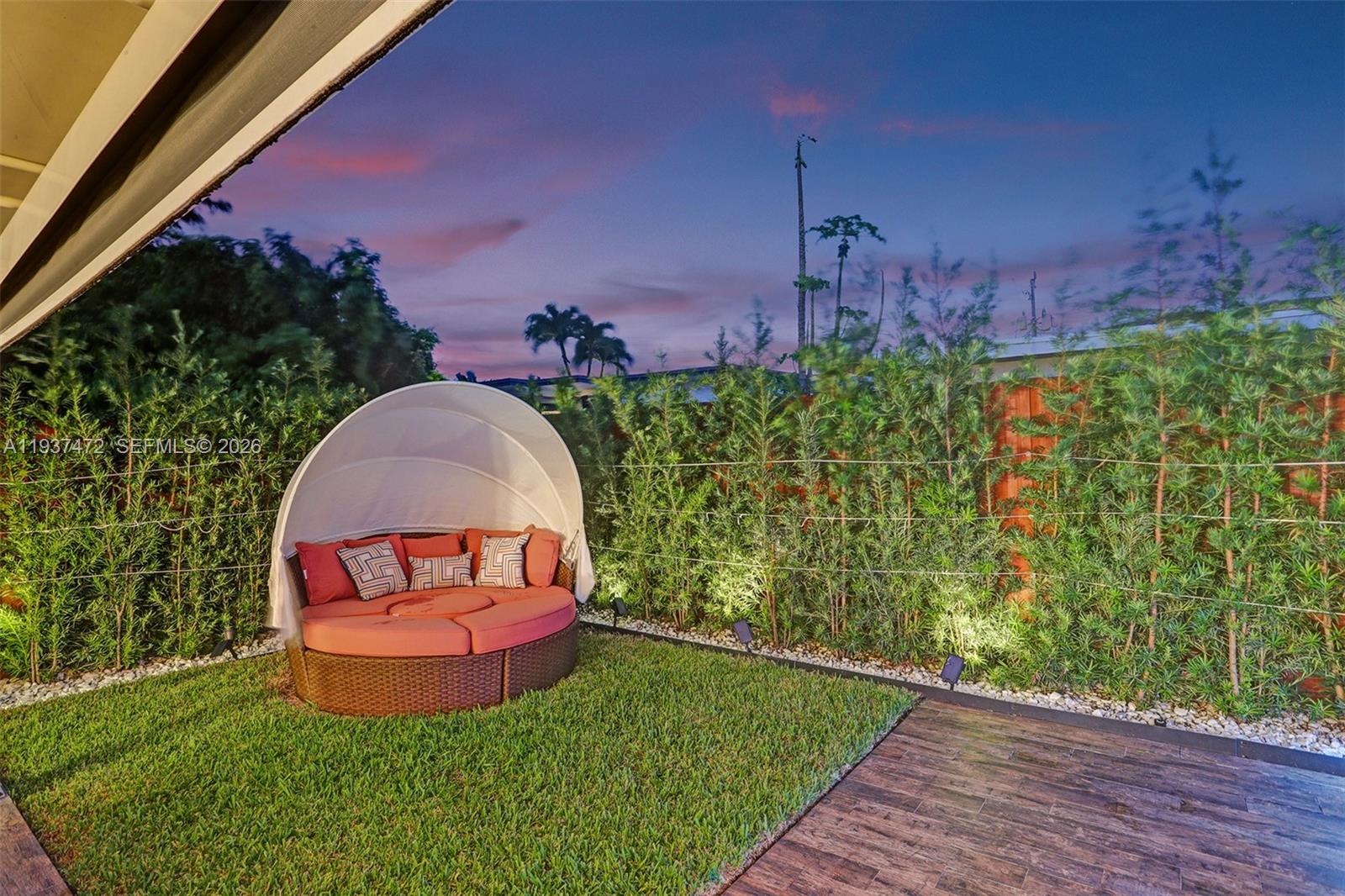 8843 Hawthorne Avenue Surfside, FL 33154 - Photo 6 of 28 an aerial view of a house with garden space and street view