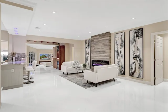 a living room with furniture and a window