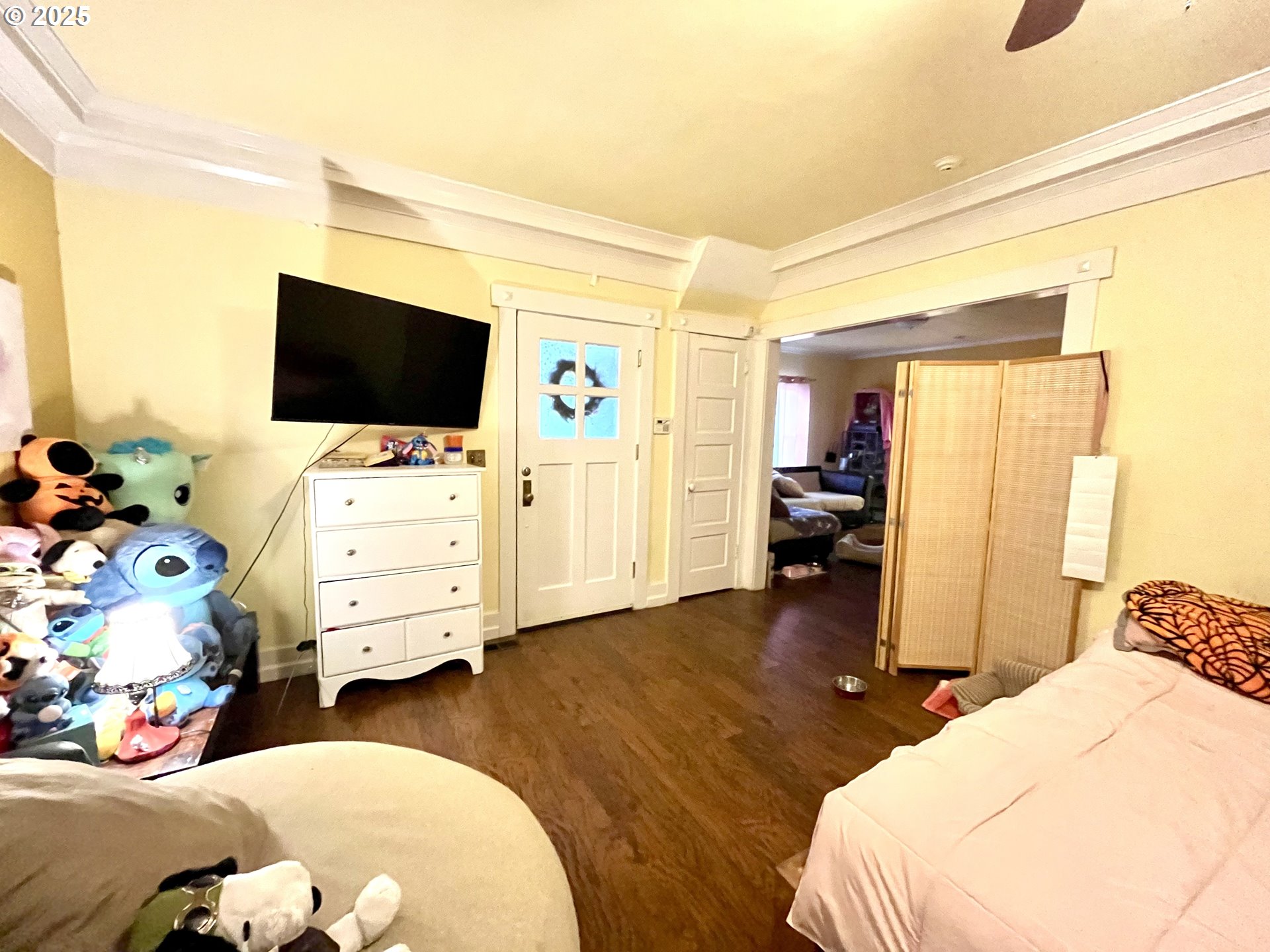 385 Southeast Twp Road Canby, OR 97013 - Photo 14 of 30 a bedroom with a bed and flat tv screen on the dresser