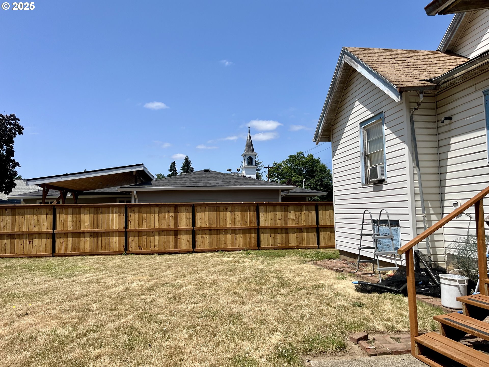 385 Southeast Twp Road Canby, OR 97013 - Photo 21 of 30 a view of a house with a yard