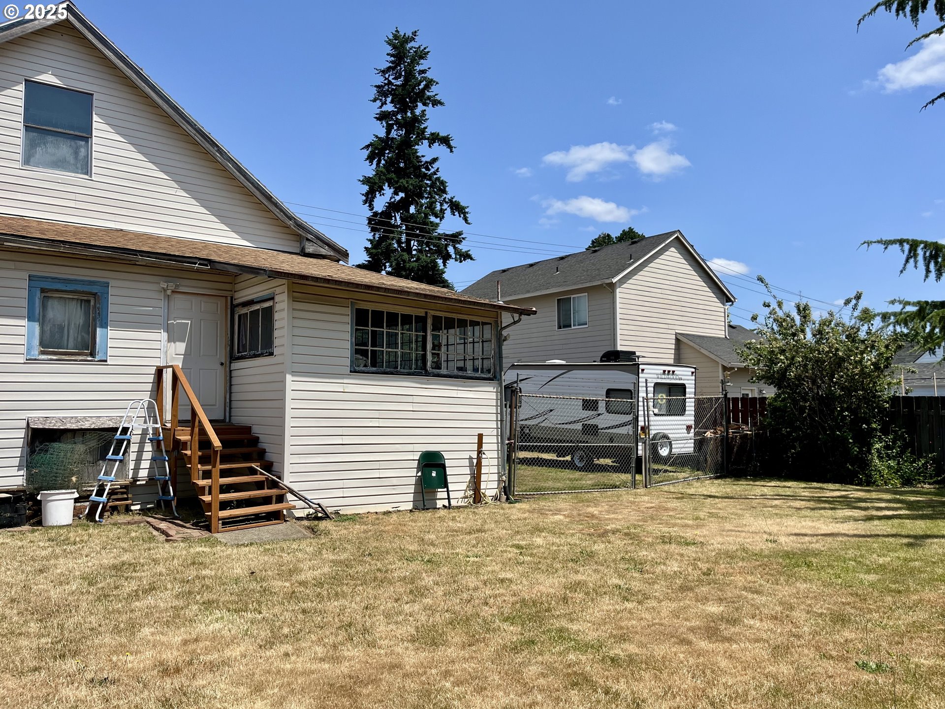 385 Southeast Twp Road Canby, OR 97013 - Photo 25 of 30 a view of a house with a yard