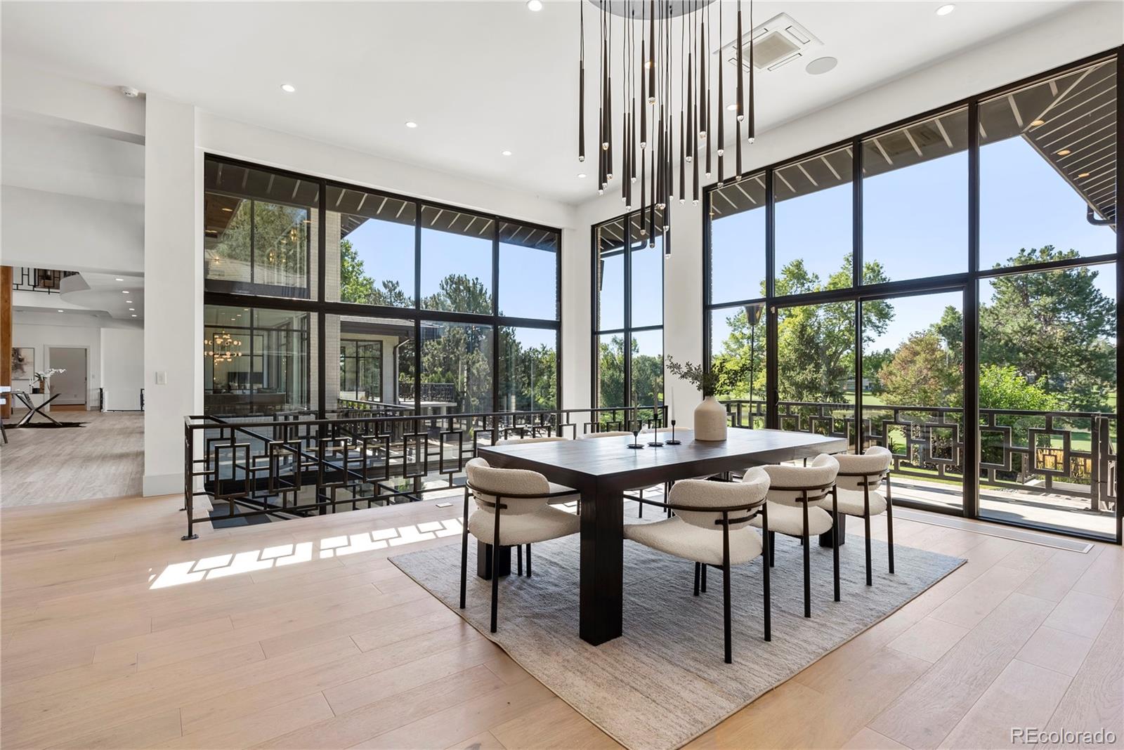 3962 South Chase Way Denver, CO 80235 - Photo 17 of 40 a view of a dining room with furniture window and outside view