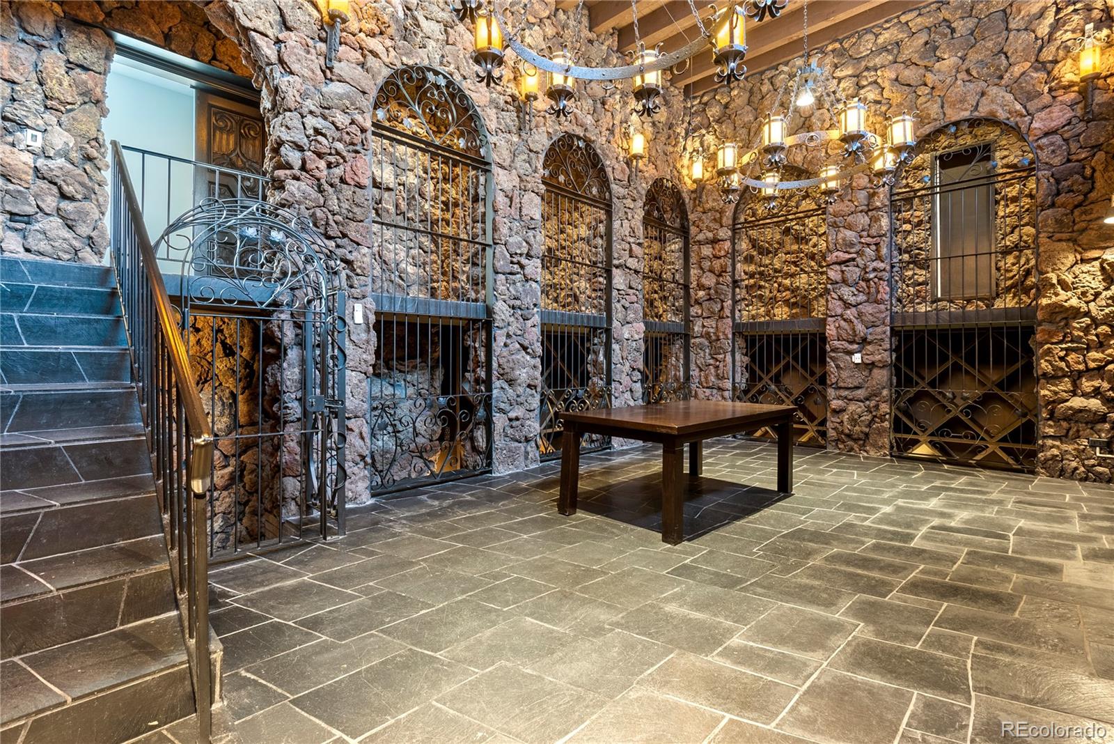 3962 South Chase Way Denver, CO 80235 - Photo 37 of 40 a view of a building with a bench