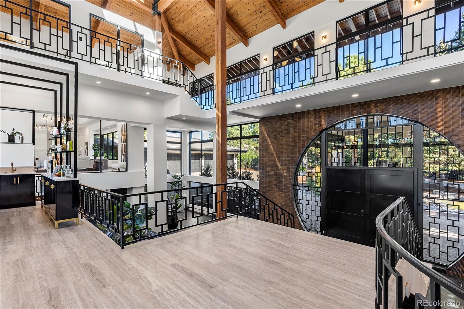 3962 South Chase Way Denver, CO 80235 - Photo 9 of 40 a view of a balcony with chairs