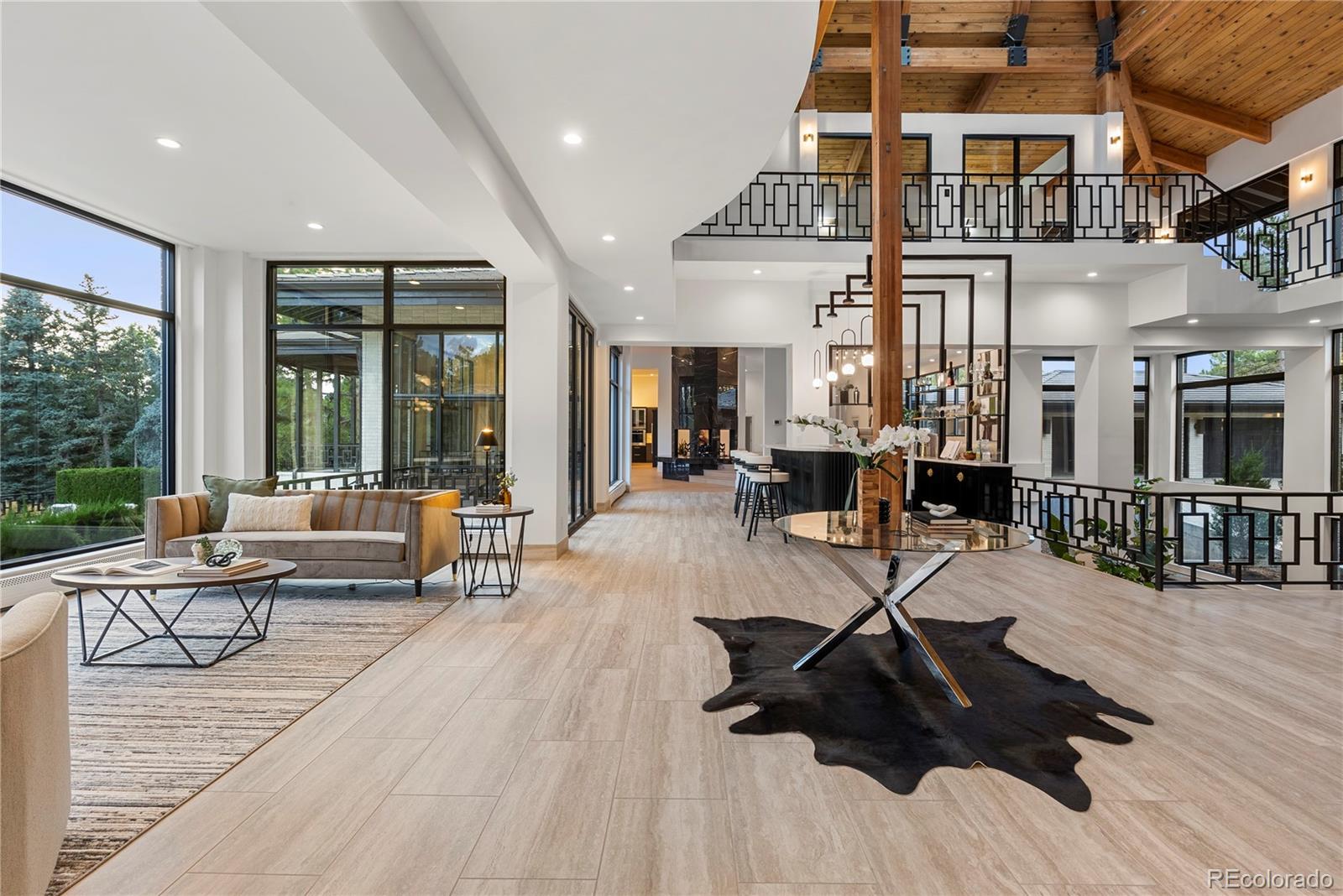 3962 South Chase Way Denver, CO 80235 - Photo 10 of 40 a living room with furniture or couch and a large window
