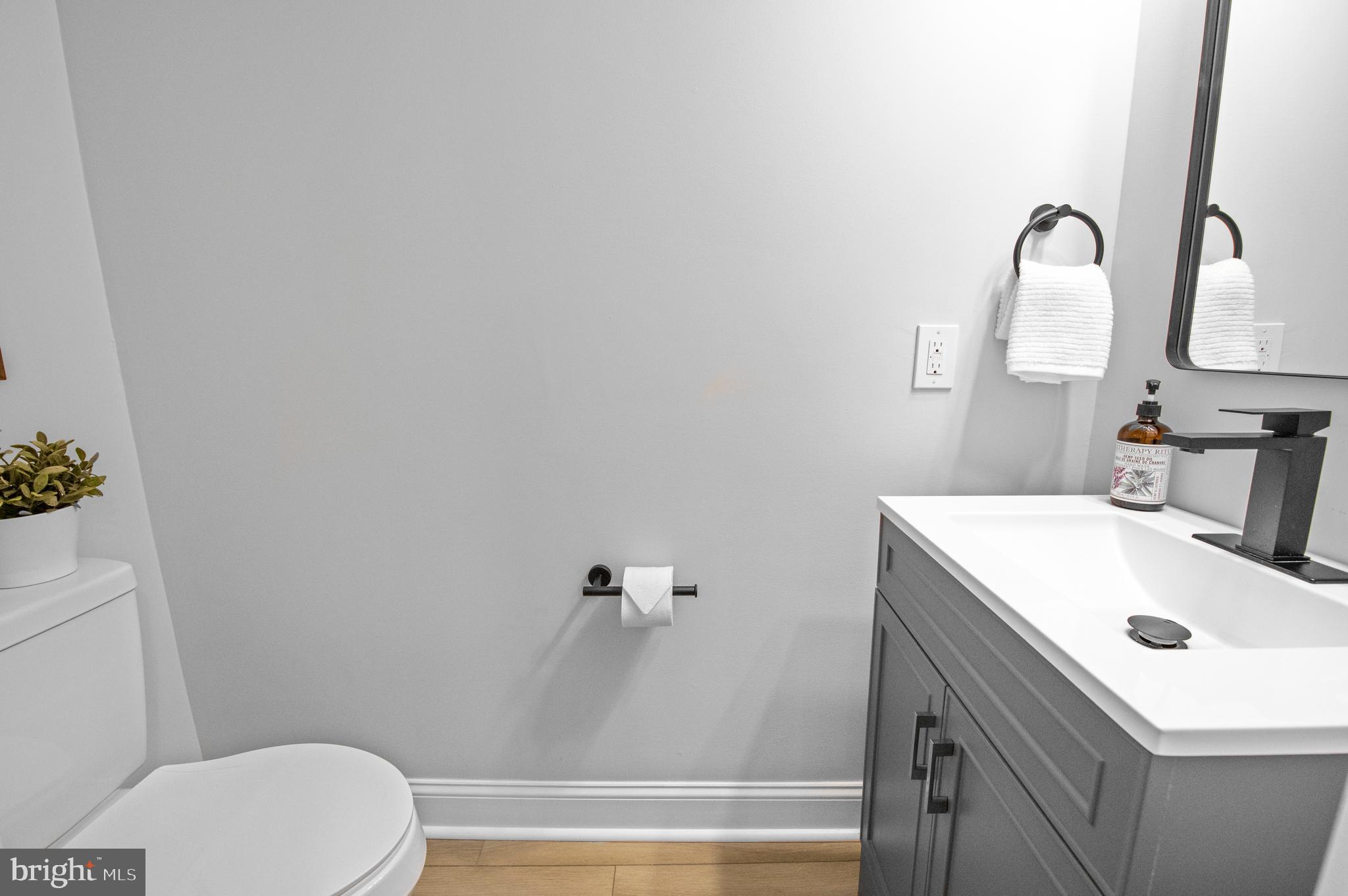 220 North Rolling Road Springfield, PA 19064 - Photo 14 of 41 a bathroom with a sink and a toilet