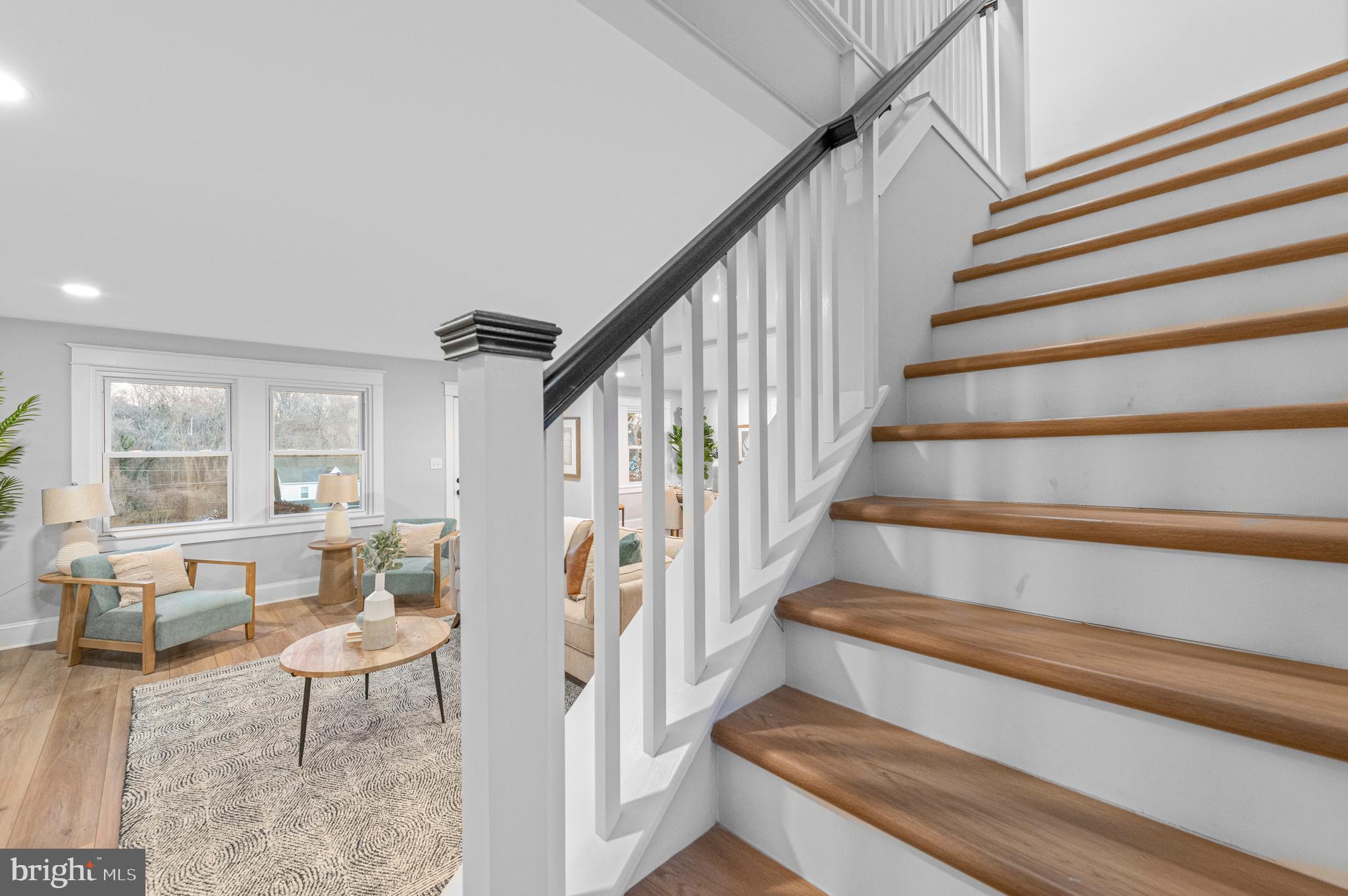 220 North Rolling Road Springfield, PA 19064 - Photo 16 of 41 a view of entryway and hall with wooden floor