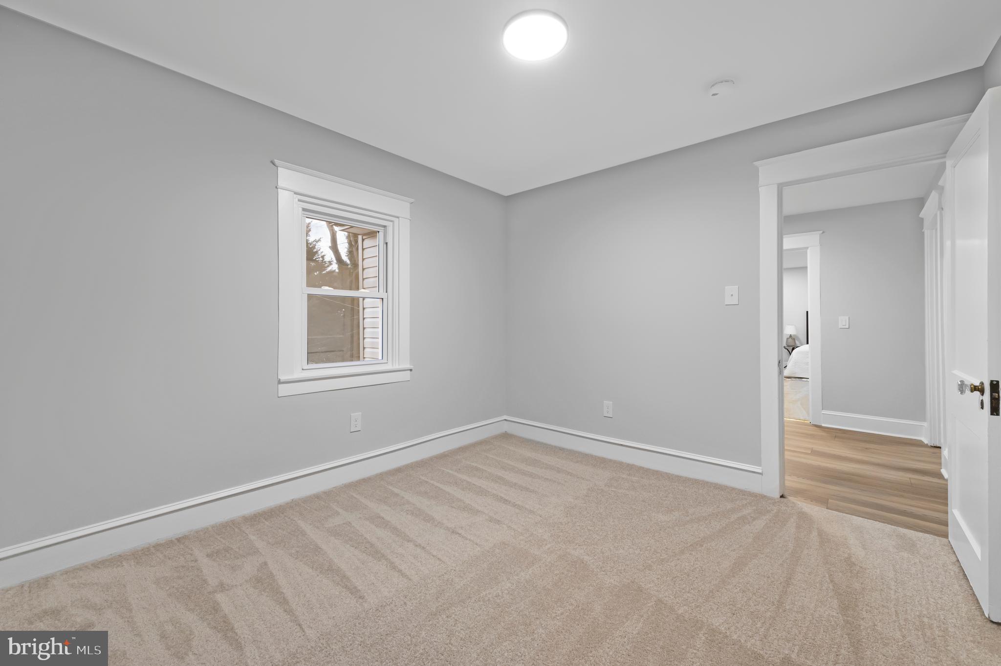 220 North Rolling Road Springfield, PA 19064 - Photo 20 of 41 a view of an empty room with closet and a window