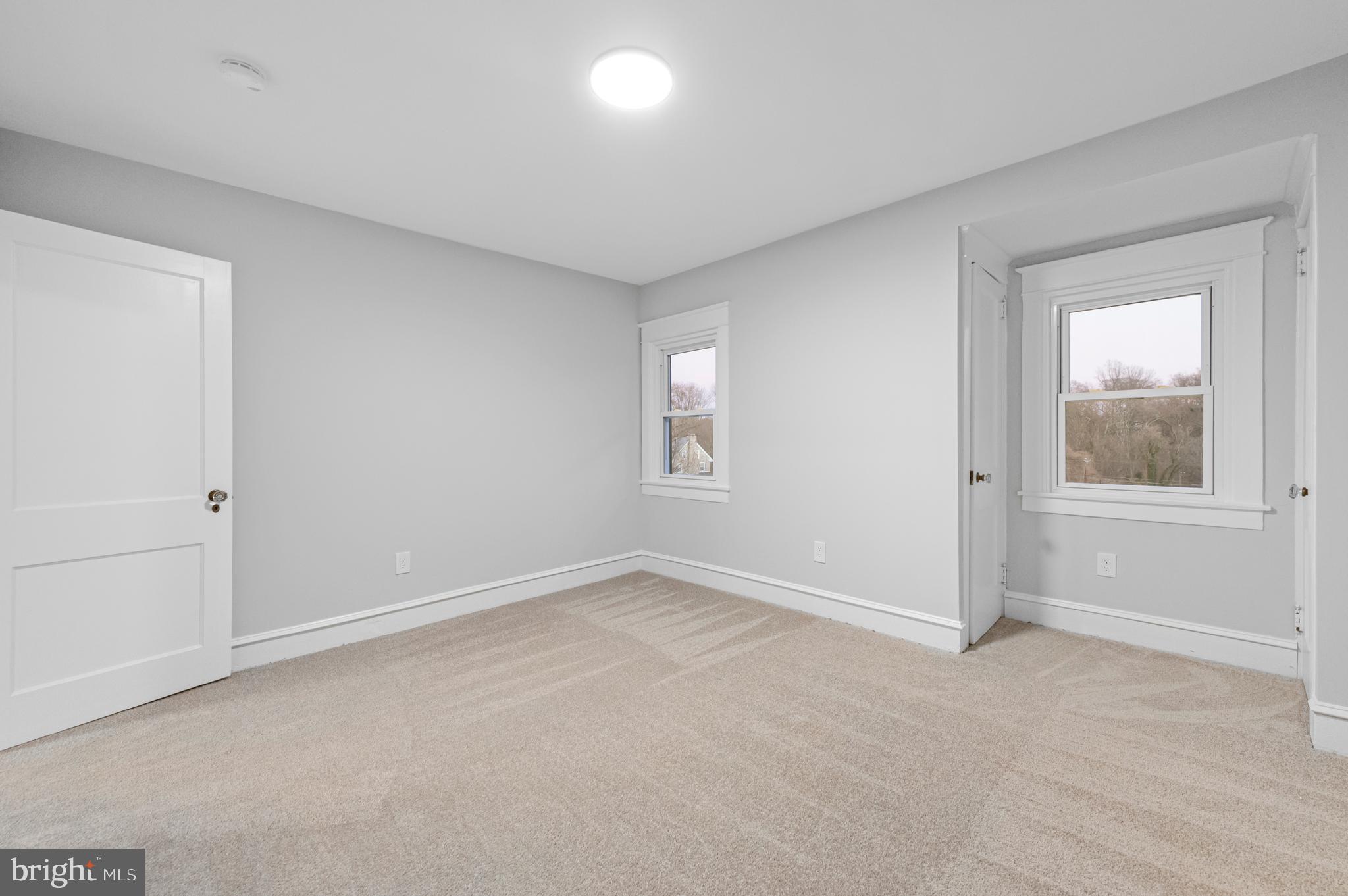 220 North Rolling Road Springfield, PA 19064 - Photo 22 of 41 a view of an empty room with a window