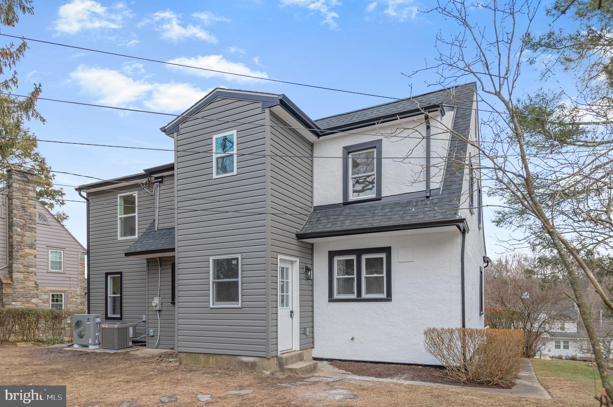 220 North Rolling Road Springfield, PA 19064 - Photo 39 of 41 a front view of a house with garage