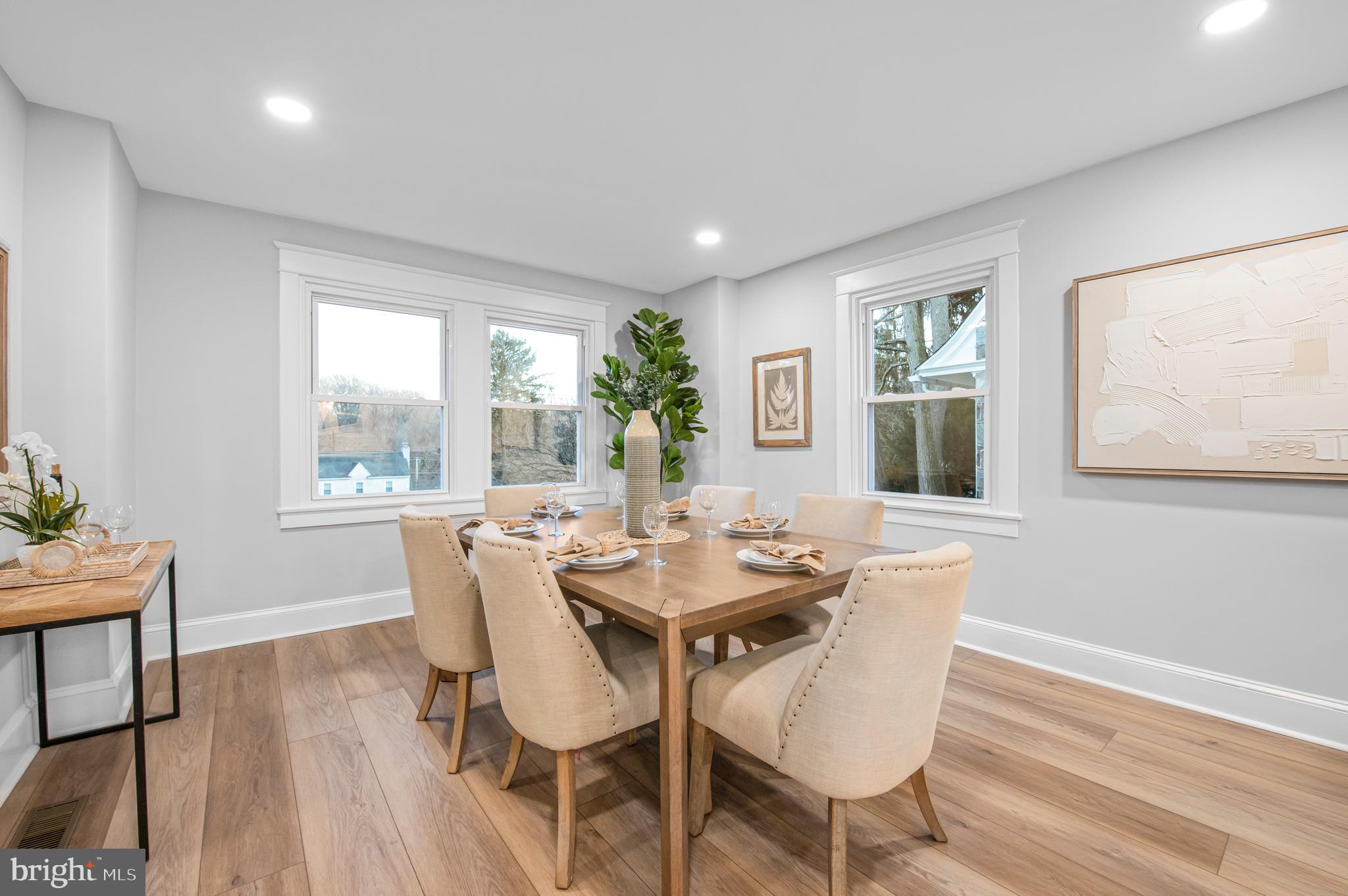 220 North Rolling Road Springfield, PA 19064 - Photo 10 of 41 a view of a dining room with furniture and wooden floor