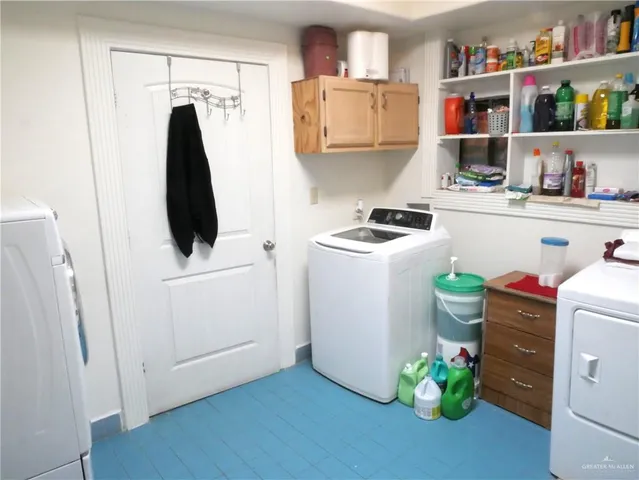 a bedroom with a bed chair and a window
