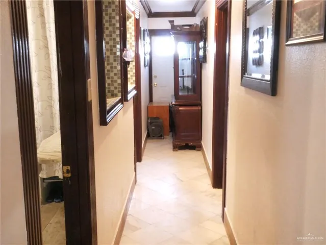 a bathroom with a toilet a sink and a mirror