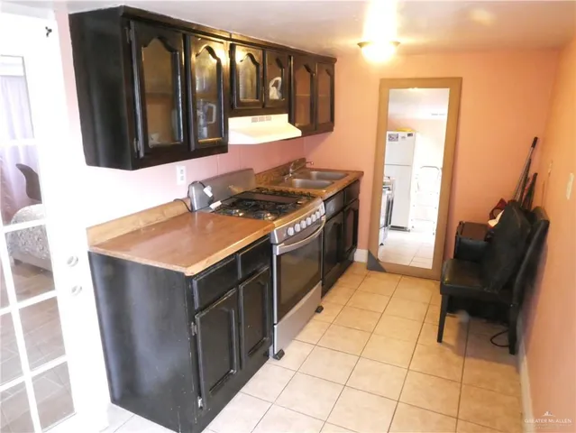 a view of outdoor space with wooden wall